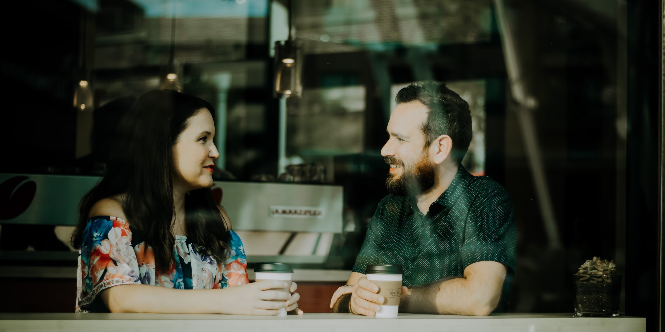 Couple chatting over coffee